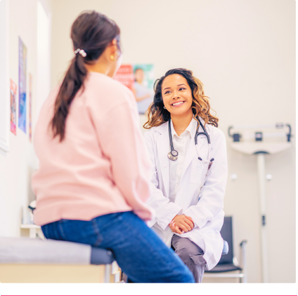 Woman speaking with a healthcare provider